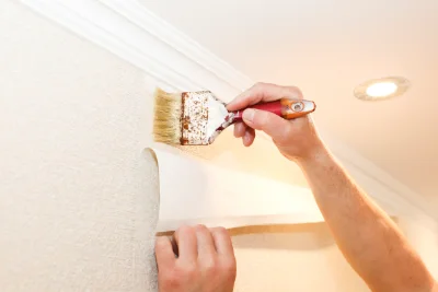 Pose de papier peint à la Houblonnière — revêtements muraux et toiles de verre